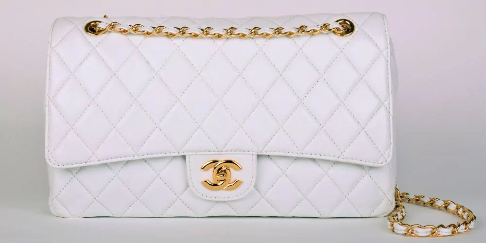 white chanel double flap hand bag
