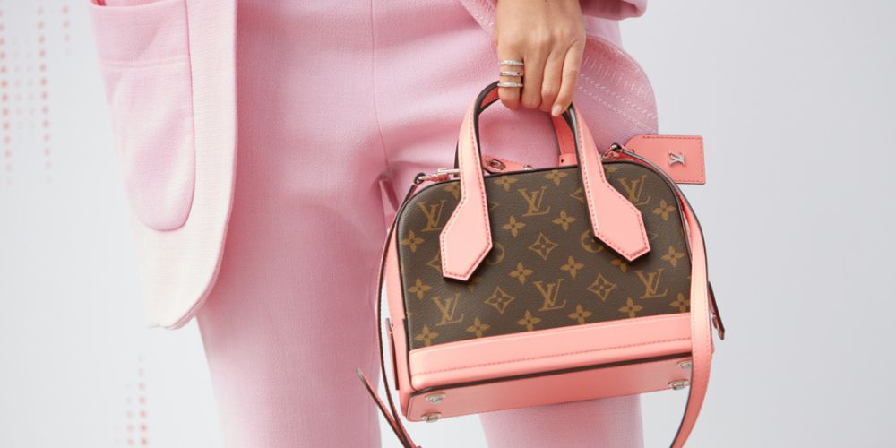 Pink Luxury Bag Worn With A Pink Outfit