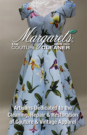 A floral-print vintage dress with the text: "Margarets the Couture Cleaner. Artisans Dedicated to the Cleaning, Repair & Restoration of Couture & Vintage Apparel.